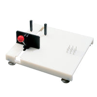 Vista superior de tabla de cortar adaptada con esquinas elevadas y superficie antideslizante